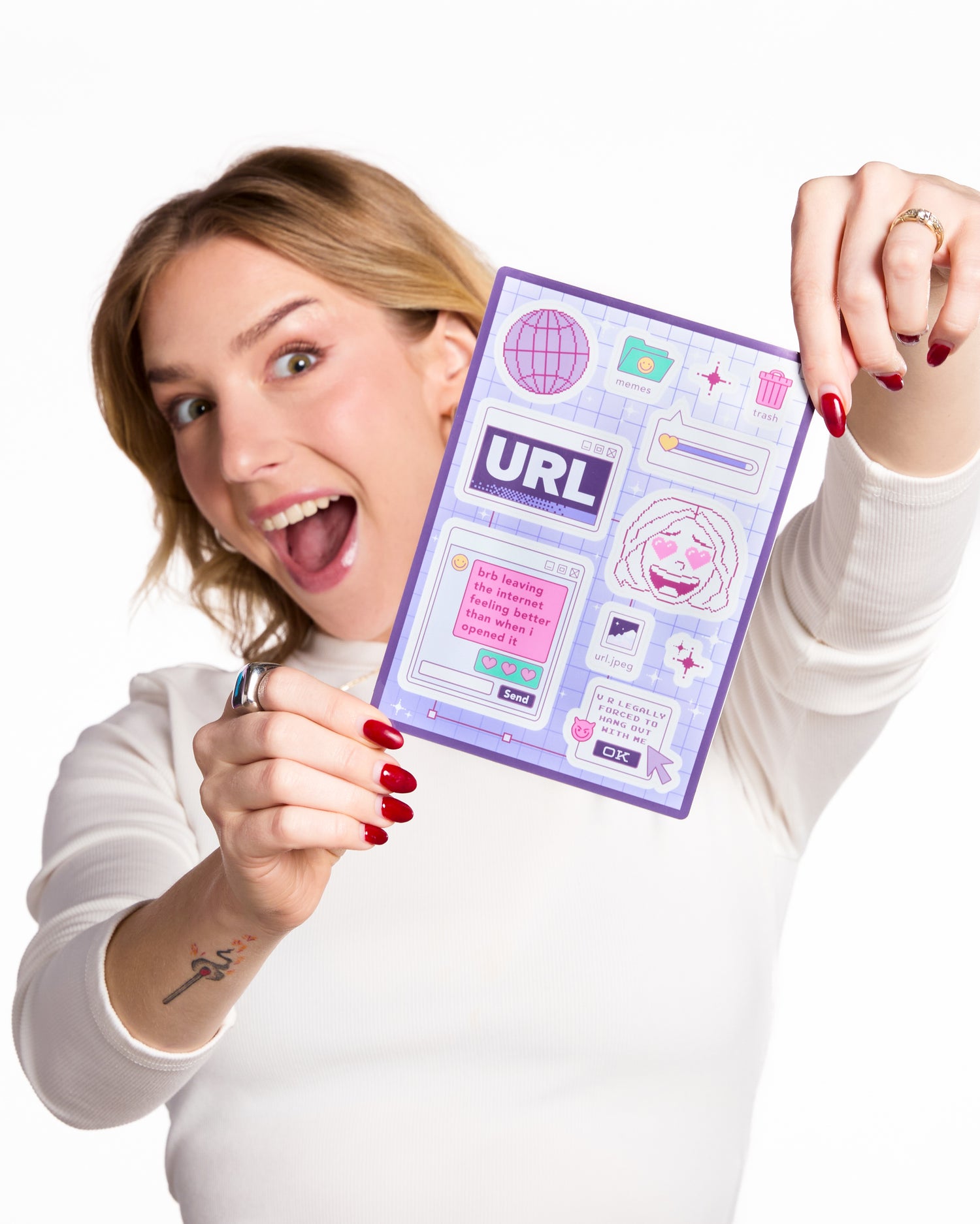 Woman holding a colorful card with URL information against a white background