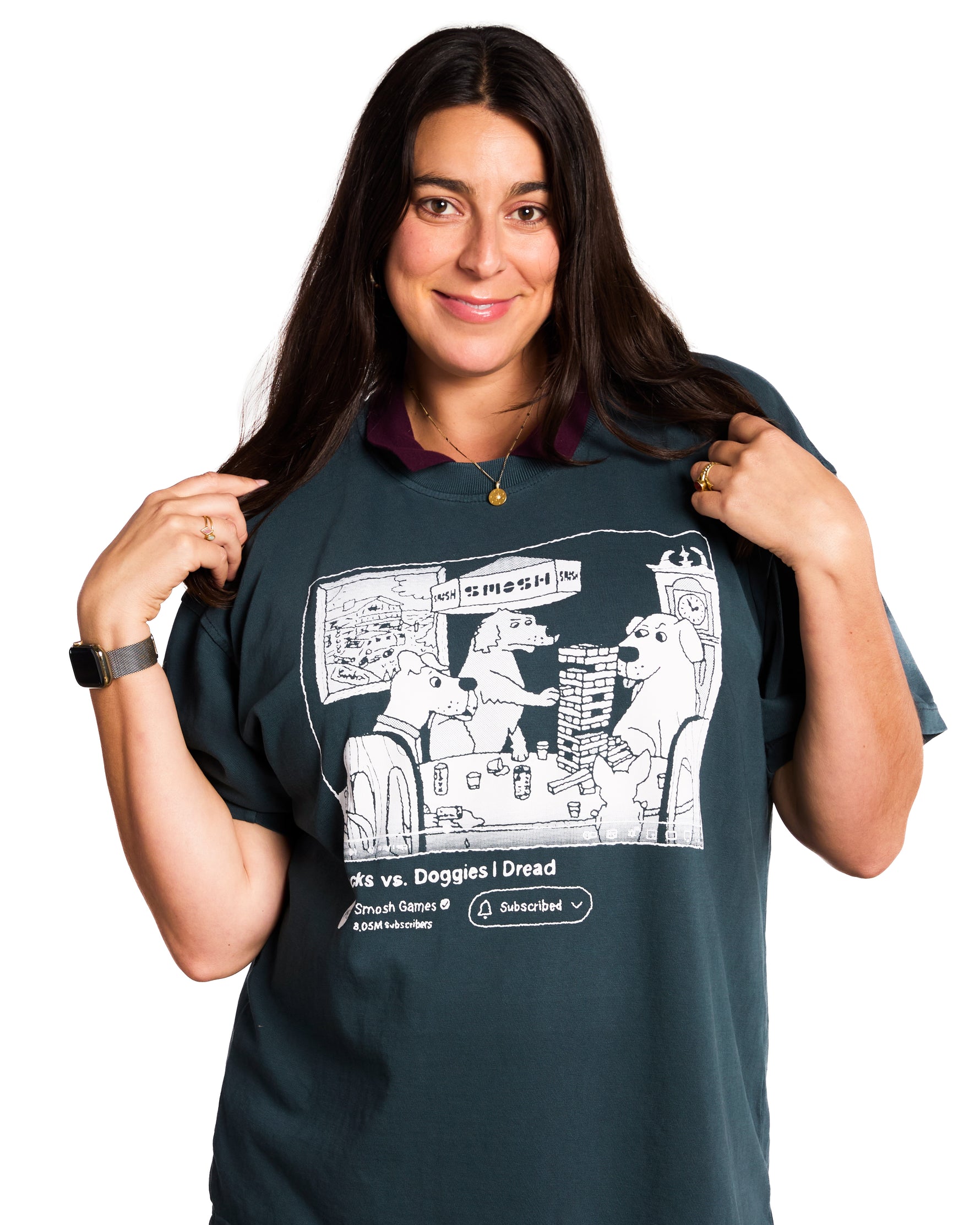 Woman wearing a dark green t-shirt with a graphic design on a white background