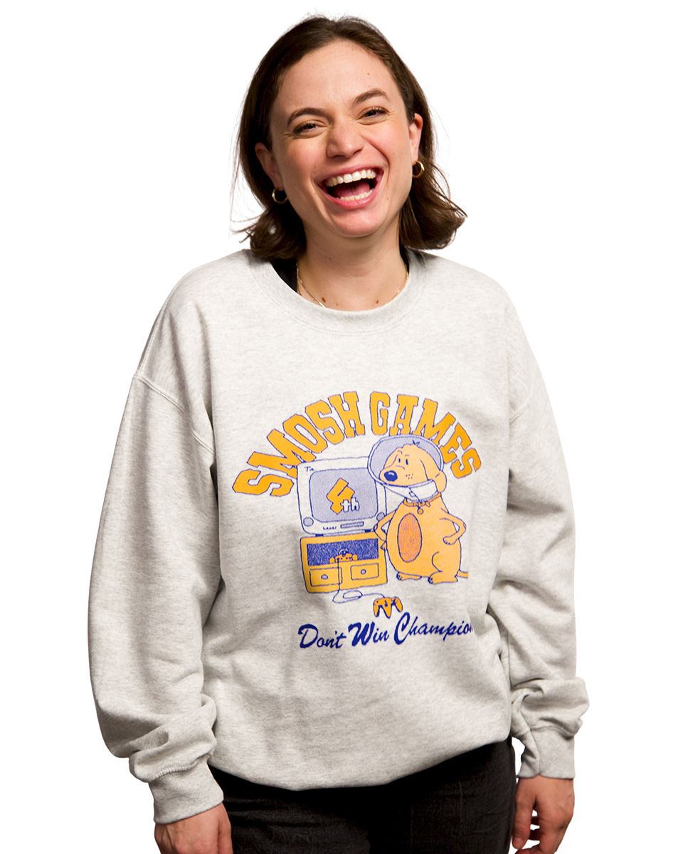 Angela wearing Smosh games "don't win" grey crewneck