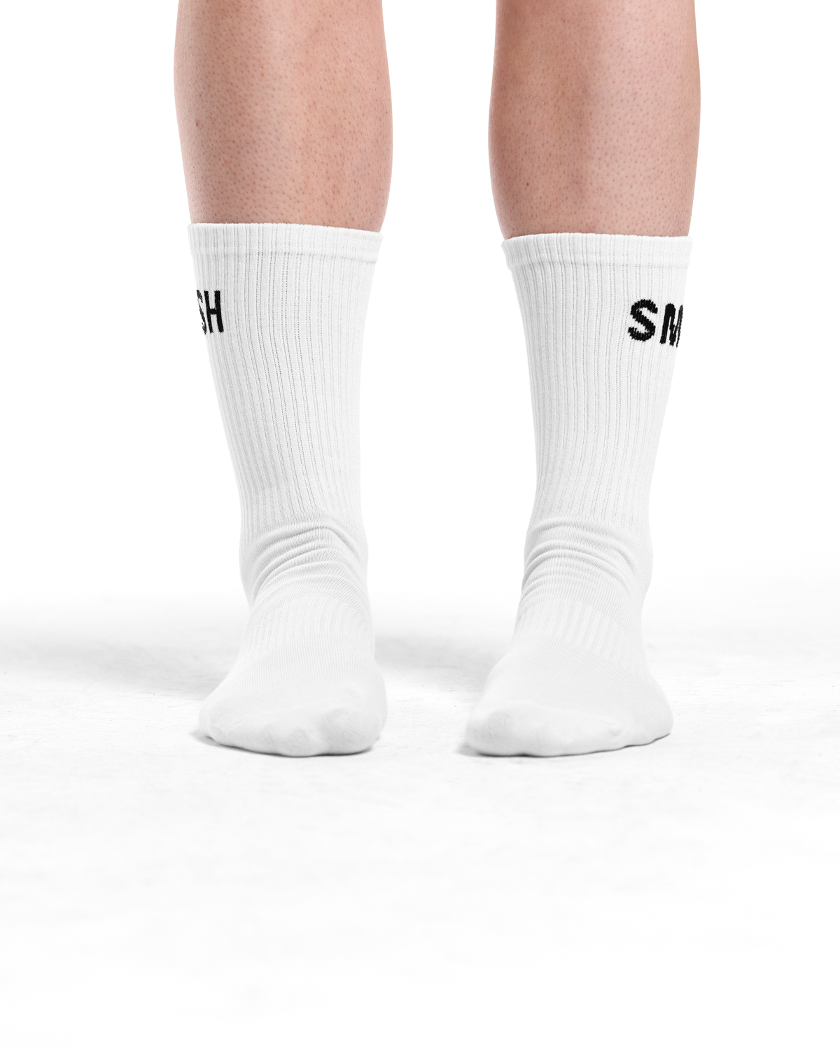White socks with black text on a white background