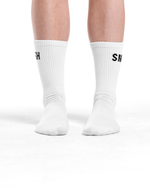 White socks with black text on a white background