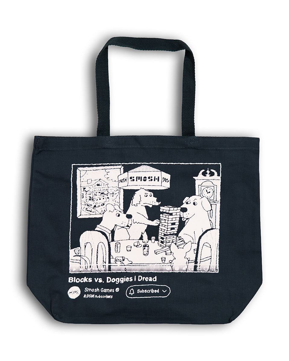Navy blue tote bag with white graphic Blocks vs. Doggies design on a white background