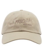 cream colored hat that says smosh est. 2002