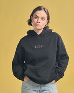 Angela Giarratana in black essentials embroidered hoodie