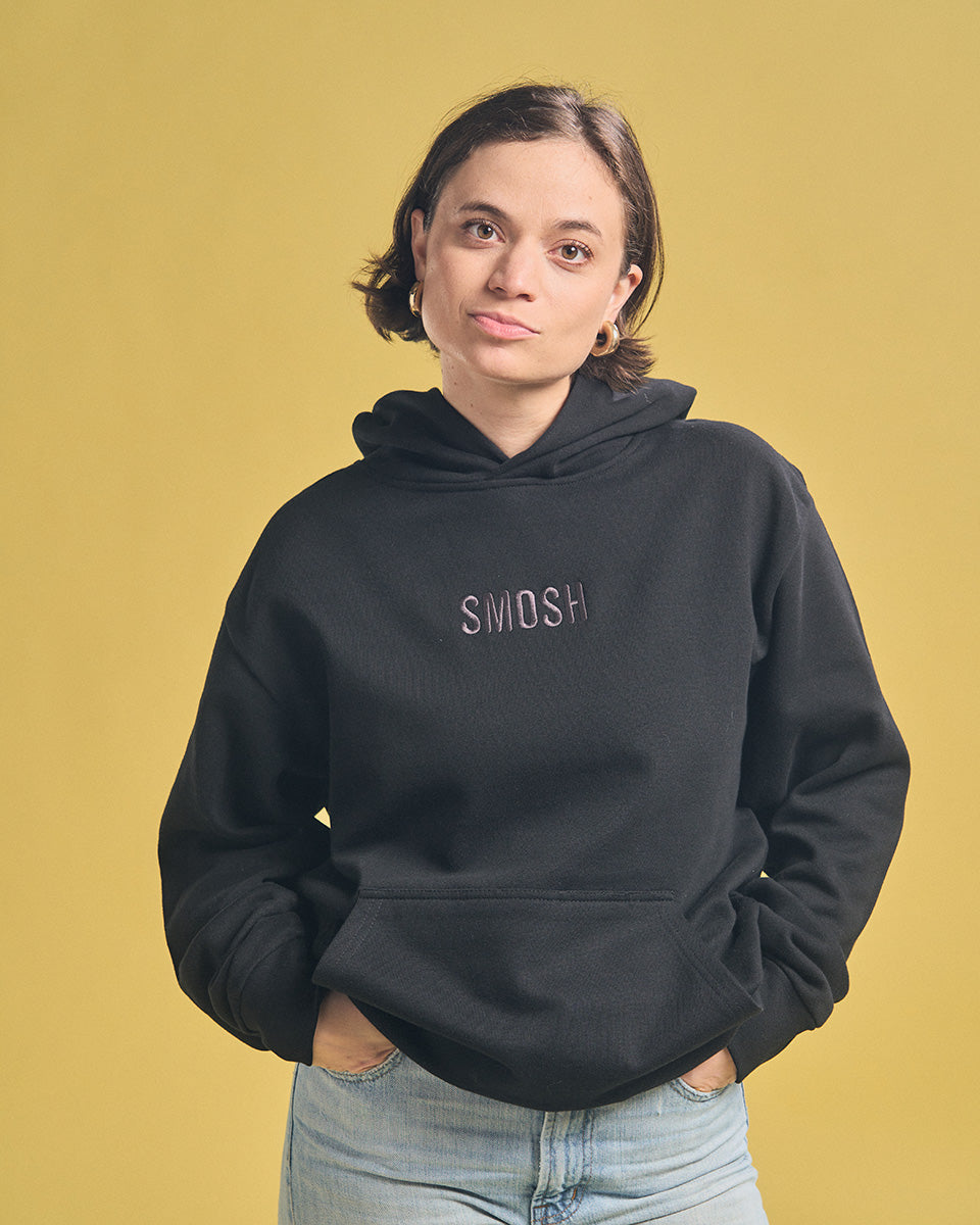 Angela Giarratana in black essentials embroidered hoodie