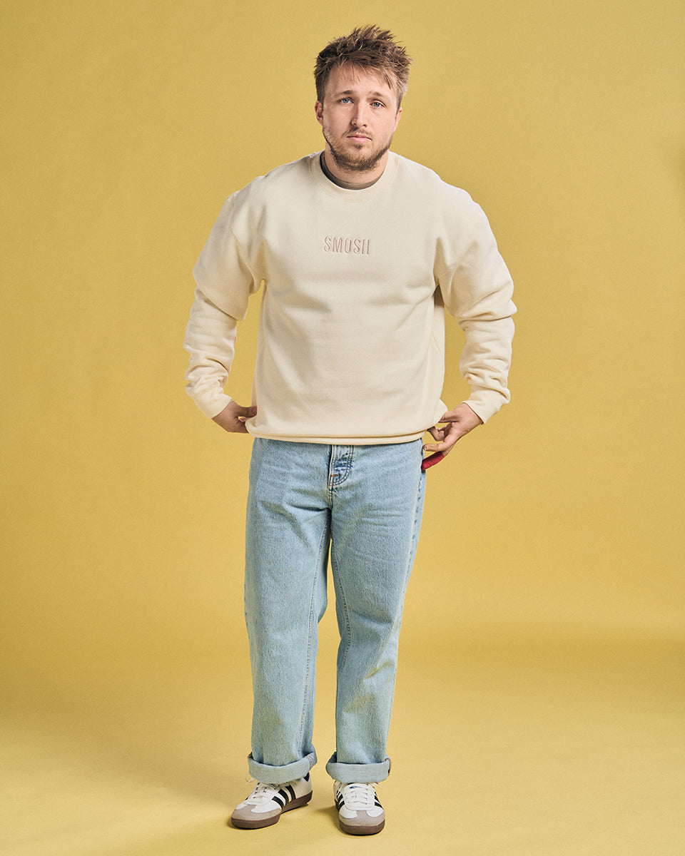 Shayne Topp wearing Cream Smosh Essentials Embroidered Crewneck