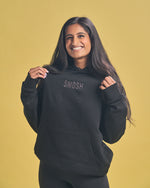 Arasha Lalani in black essentials embroidered hoodie