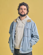 Spencer Agnew in grey Smosh essentials embroidered hoodie