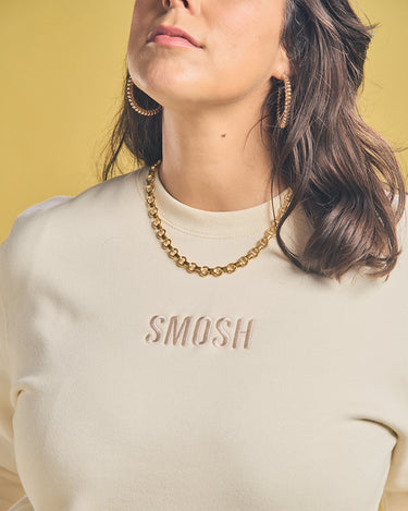 Amanda lehan-Canto wearing Cream Smosh Essentials Embroidered Crewneck