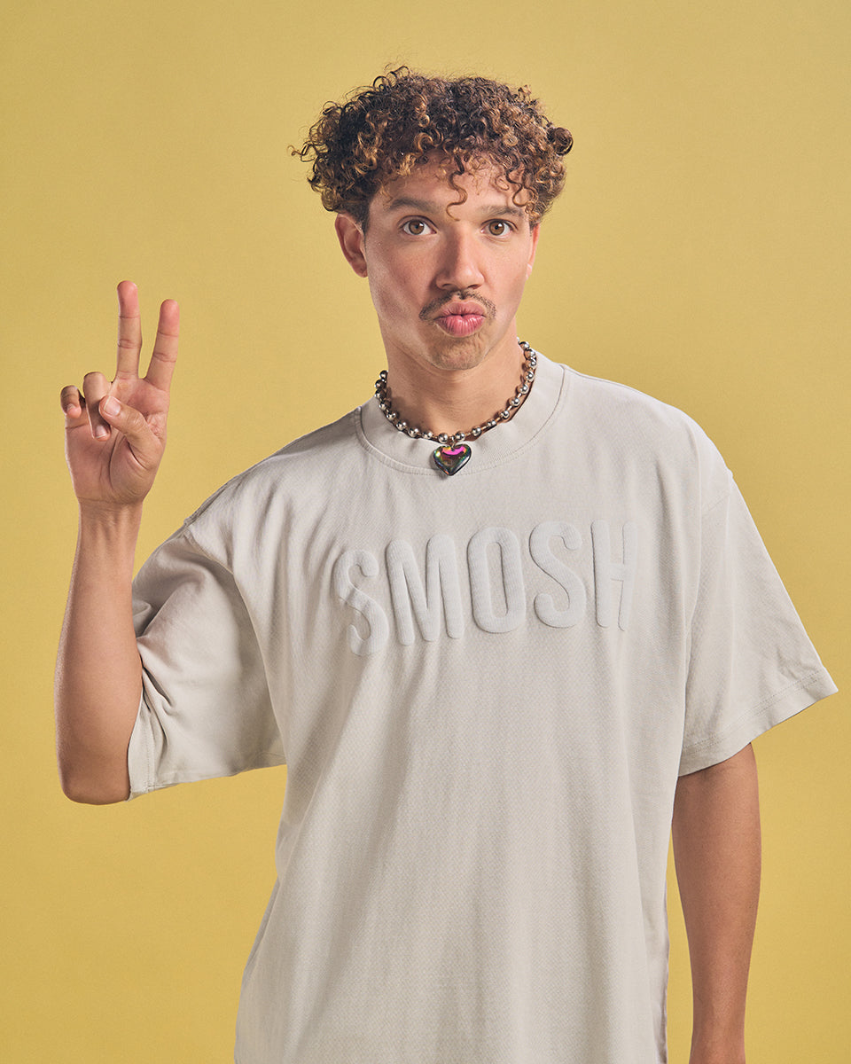 Chanse McCrary in a cream smosh puffy tee