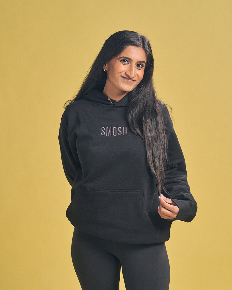 Arasha Lalani in black essentials embroidered hoodie