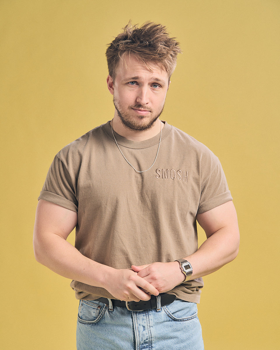 Shayne Topp in short sleeve faded brown smosh essentials embroidered tee