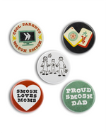 Set of five buttons with various designs and text on a white background