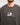 Tommy Bowe Smosh wearing faded grey short sleeve chronically offline logo tshirt close up