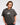 Angela Giarratana Smosh wearing faded grey short sleeve chronically offline logo tshirt