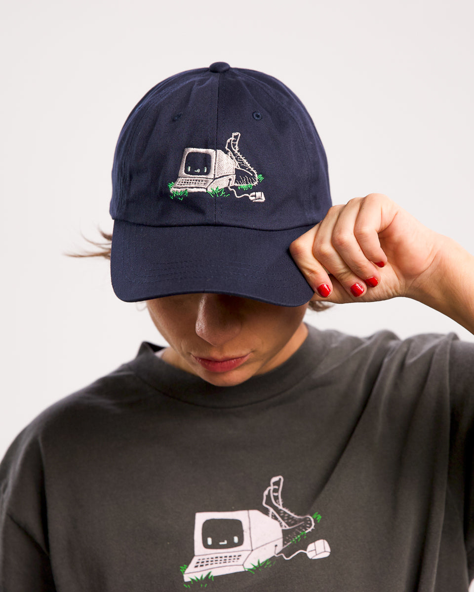 Angela Giarratana wearing smosh navy blue base ball cap with chronically offline logo
