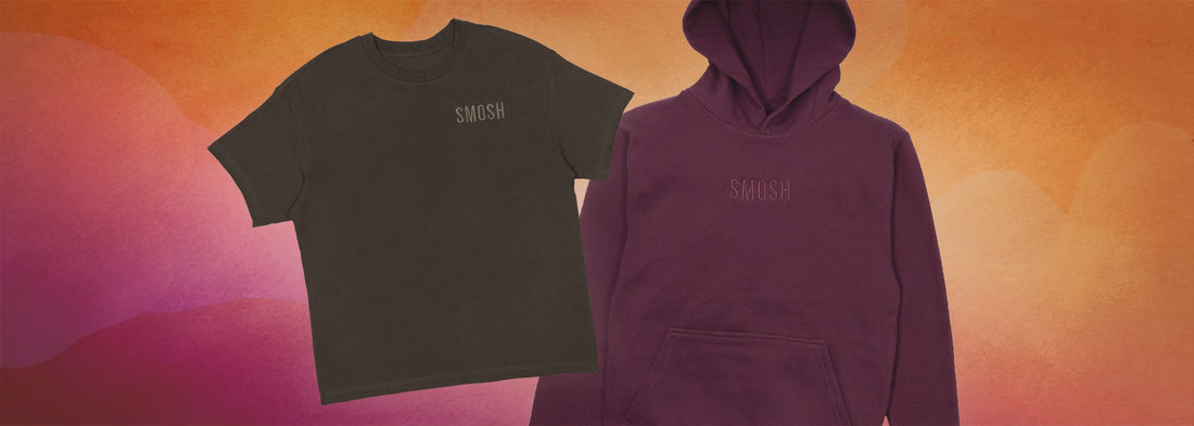 Video showcasing the brown embroidered essentials SMOSH shirt and the maroon embroidered essentials SMOSH shirt. Fall colored leaves are falling down the video in the background while the shirt and hoodie are still images