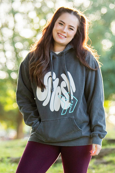 Sarah Whittle from Smosh wearing Smosh Groovy Hoodie with puff ink