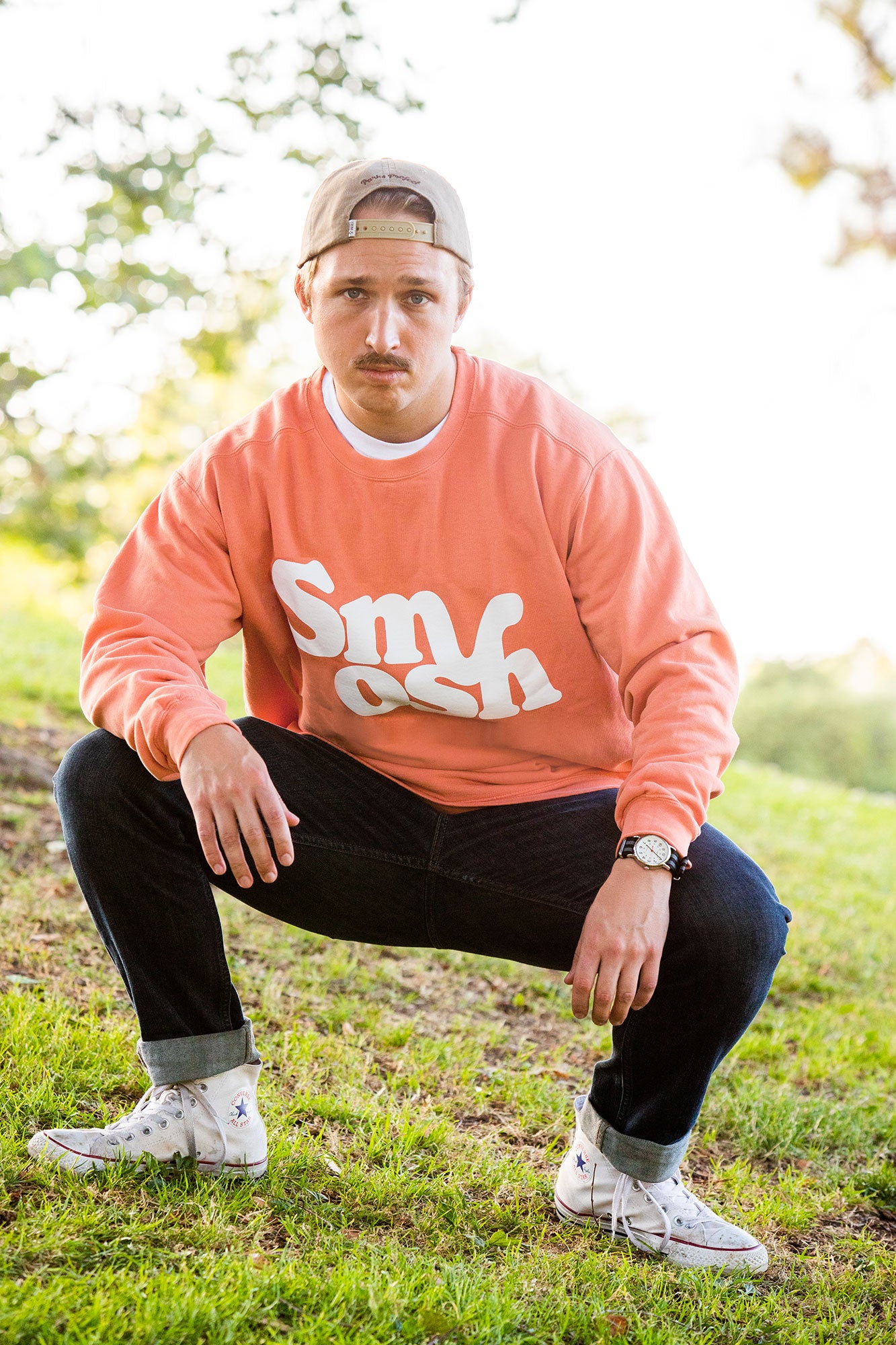 Shayne Topp from Smosh wearing Retro Logo Crewneck in Terracotta
