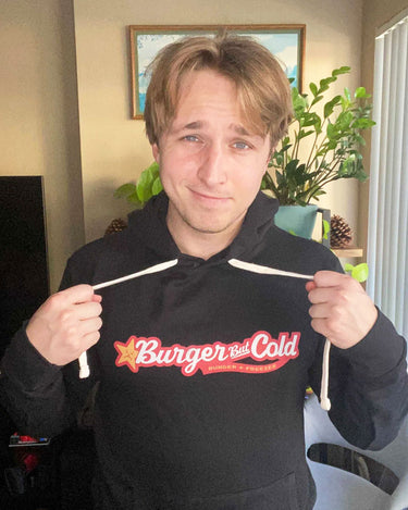 Shayne Topp from Smosh wearing Burger But Cold parody hoodie